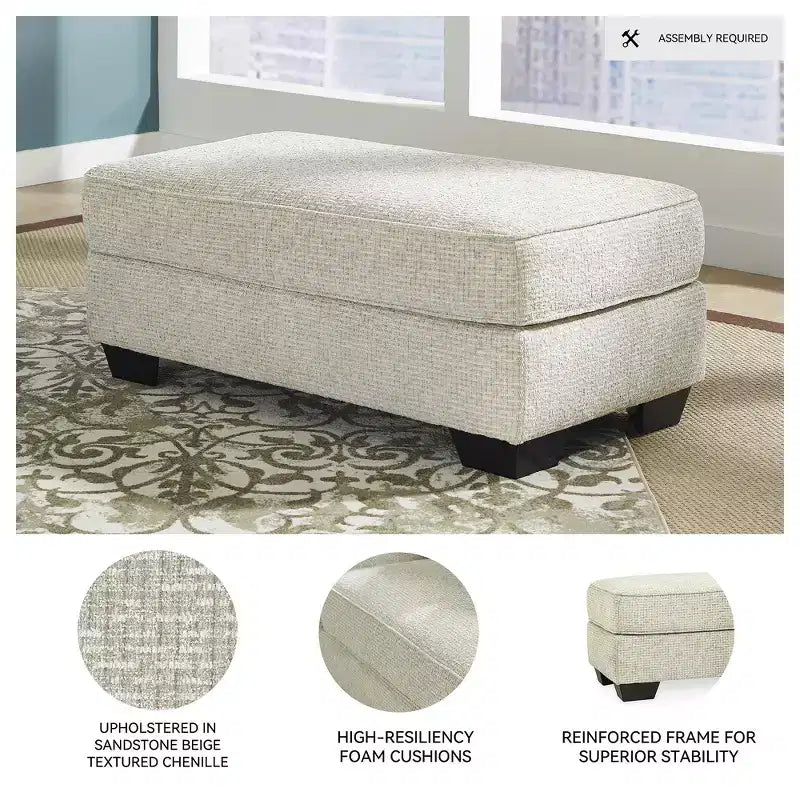 Pouf ottomano rivestito in ciniglia color sabbia per soggiorno