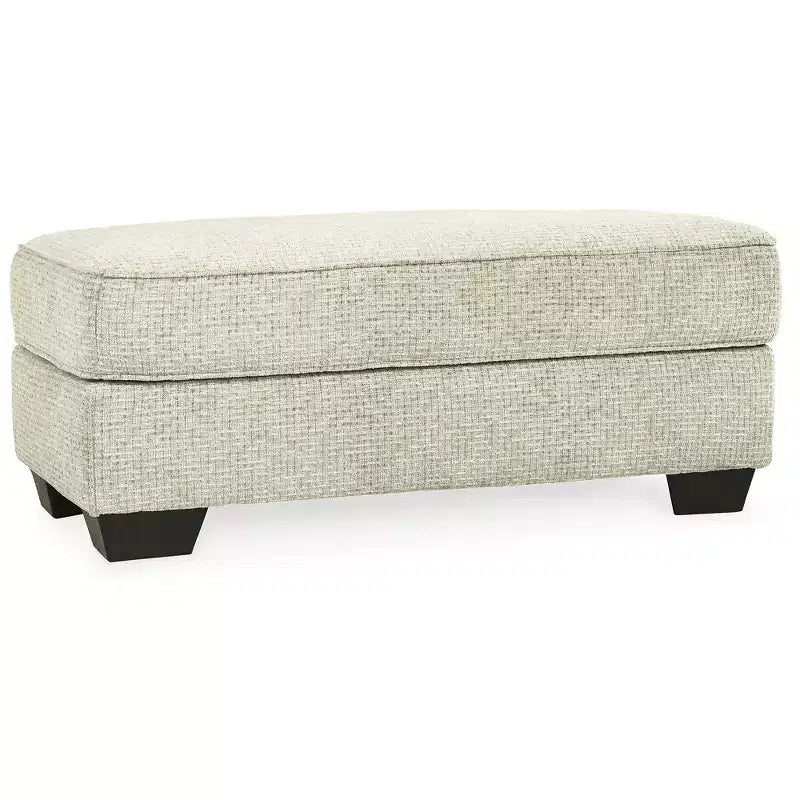 Pouf ottomano rivestito in ciniglia color sabbia per soggiorno