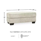 Pouf ottomano rivestito in ciniglia color sabbia per soggiorno