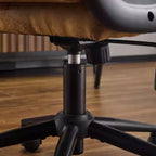Fauteuil de bureau pivotant noir en cuir imitation chat avec points de tirage, dossier dissimulable et clous