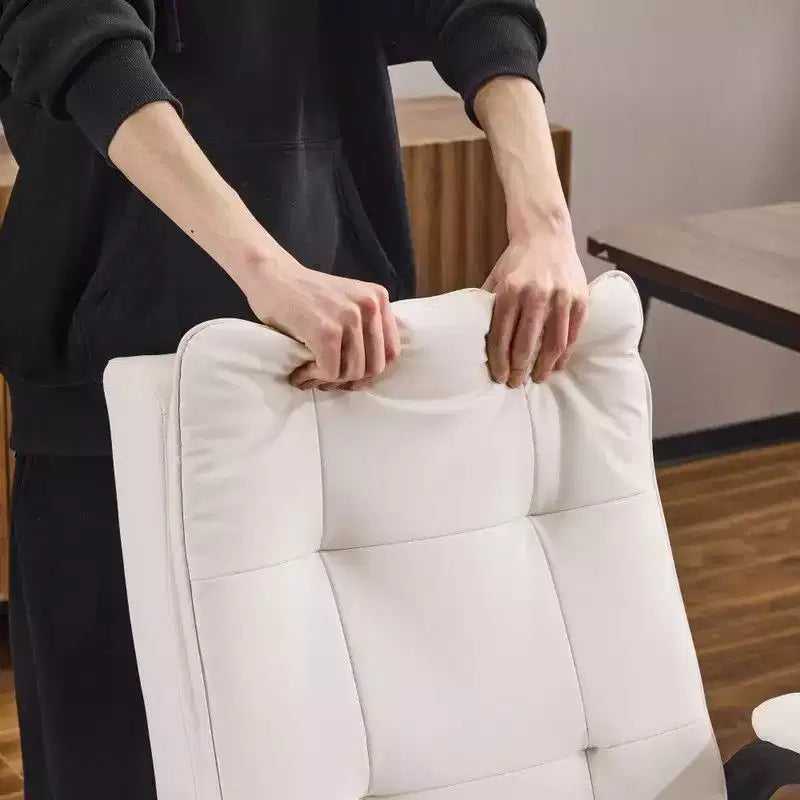 Fauteuil de bureau pivotant noir en cuir imitation chat avec points de tirage, dossier dissimulable et clous