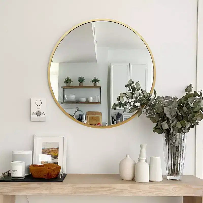 Specchio da bagno rotondo moderno in metallo dorato da parete