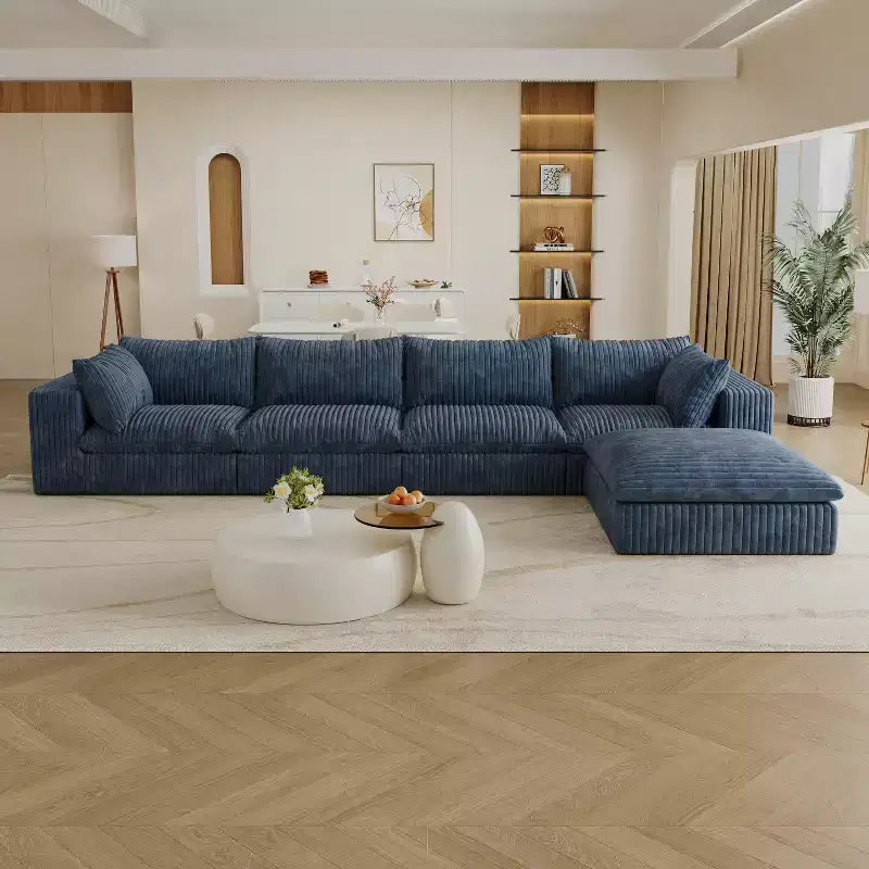 GDFStudio Jocelyn Divano Sezionale a L Moderno a 4 Posti in Tessuto a Coste e Imbottitura in Piuma con Pouf