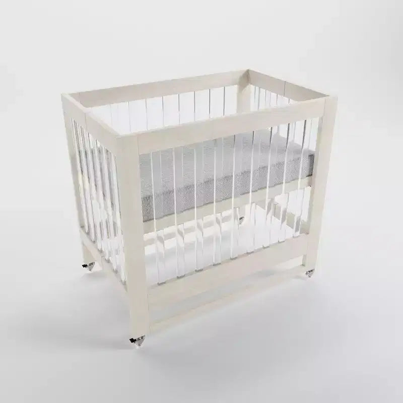 Culla pieghevole MelO Caress, telaio moderno in acrilico con 4 livelli di altezza, ruote scorrevoli e design facile da piegare Bianco lavato