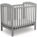 Delta Children Sprout Mini Crib With Adjustable Height and Mattress