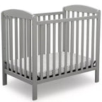 Delta Children Sprout Mini Crib With Adjustable Height and Mattress