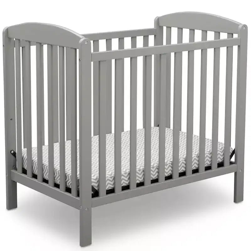 Delta Children Sprout Mini Crib With Adjustable Height and Mattress