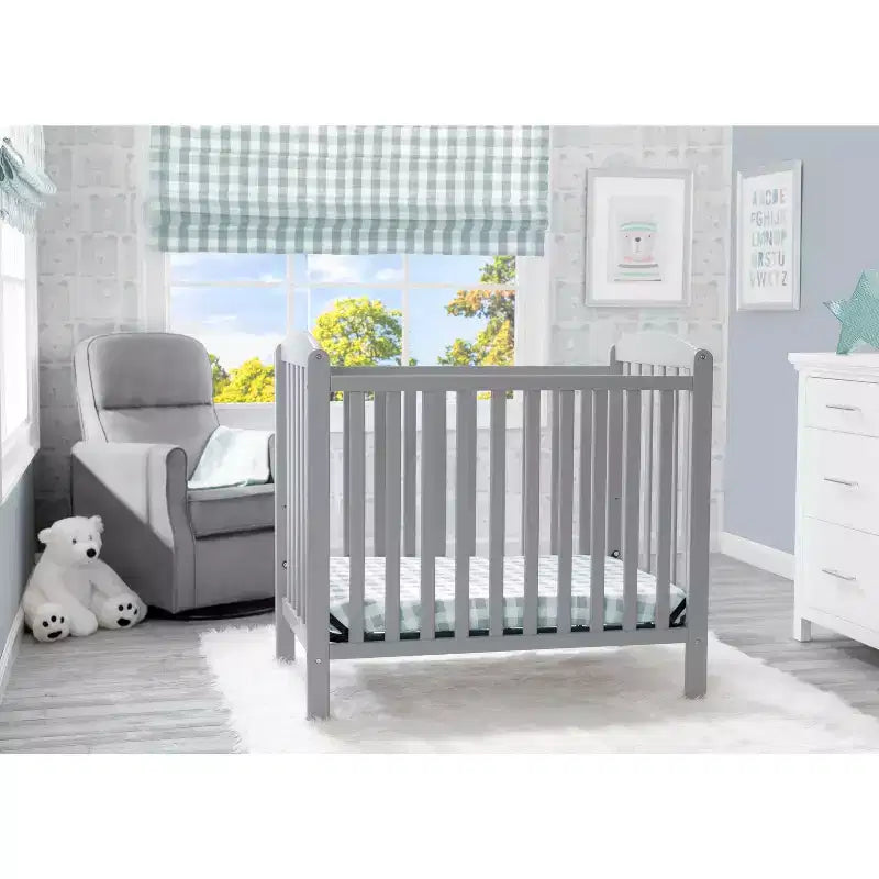 Delta Children Sprout Mini Culla con Altezza Regolabile e Materasso