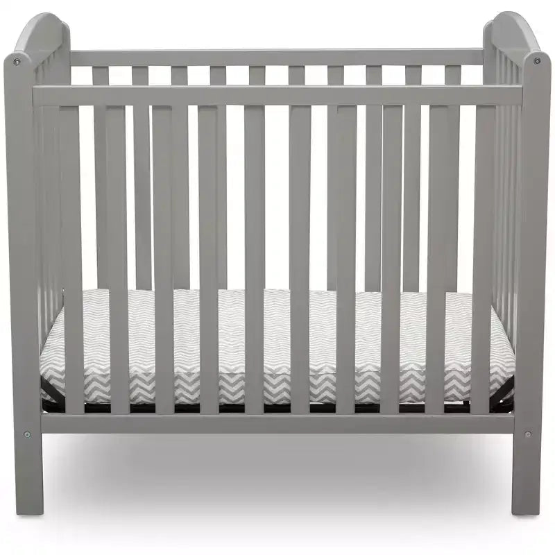 Delta Children Sprout Mini Culla con Altezza Regolabile e Materasso