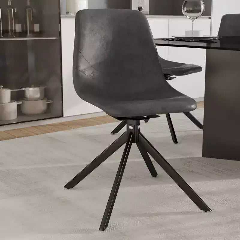 Chaise de salle à manger en cuir LeisureMod avec pivotement à 360 degrés et pieds en fer thermolaqué