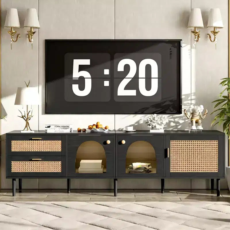 JVNOXK 70-inch rattan TV stand with 3 cabinets and 2 drawers featuring LED lighting. Suitable for TVs up to 80 inches. Ideal for living rooms. Black