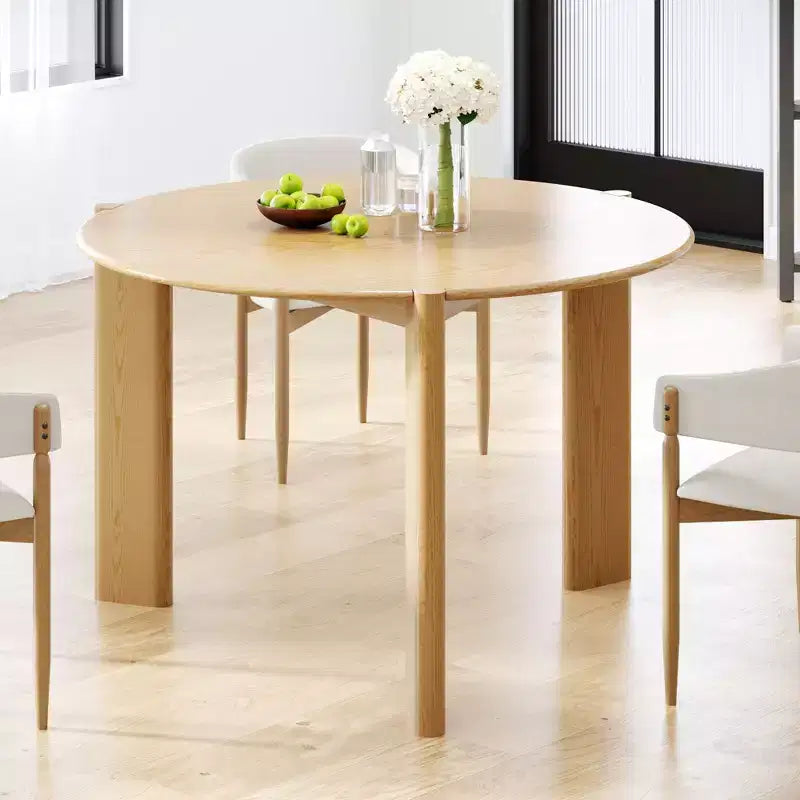 Tavolo da pranzo rustico in legno massello con piano rotondo effetto legno e base a croce per sale da pranzo moderne e riunioni di famiglia