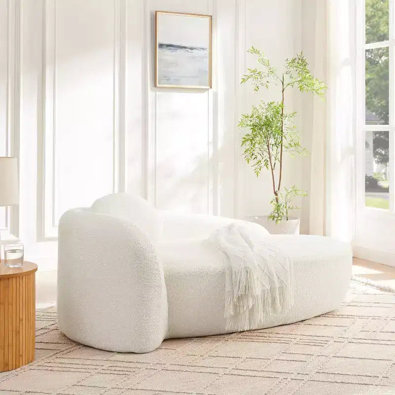 Moderno divanetto ovale in tessuto bouclé, poltrona compatta da salotto con braccioli laterali e cuscino per soggiorno e camera da letto - Panipeachy